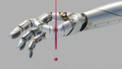 an animated robot hand squeezes a glass tube like a piezo actuator