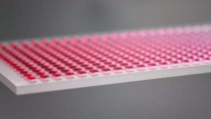 Hydrophilic areas enclosed by a superhydrophobic surface allow precise control over the size, shape and placement of the dispensed microdroplets